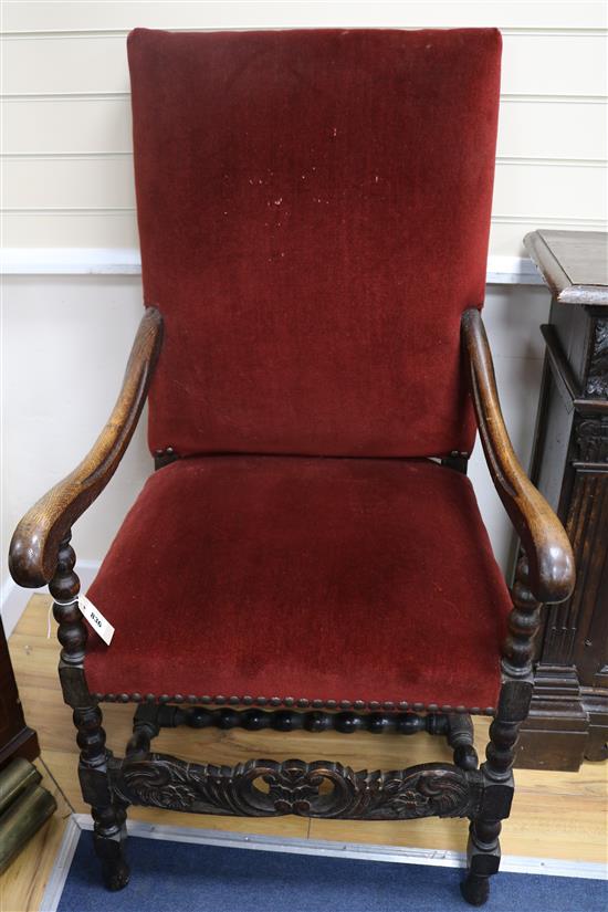 An Edwardian bobbin turned barley twist oak armchair